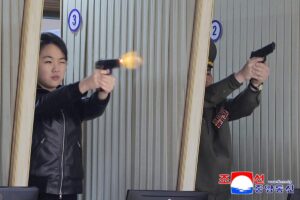 Kim-Jong-Un-daughter-Ju-Ae-test-pistols-at-munitions-factory.jpg