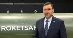 Murat-Ikinci-General-Manager-of-Roketsan-stands-next-to-a-Tayfun-ballistic-missile-at-the-companys-f.webp