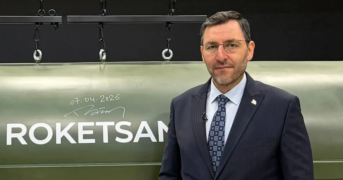 Murat-Ikinci-General-Manager-of-Roketsan-stands-next-to-a-Tayfun-ballistic-missile-at-the-companys-f.webp
