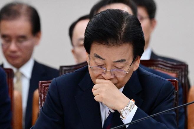 Unification-Minister-mourns-former-North-Korean-IOC-member-Chang-Ung.jpg