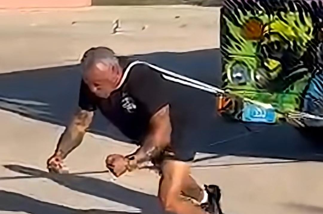 Athlete-pulls-21737-pound-bus-with-his-neck.jpg
