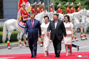 Xi-Kim-pledge-deeper-ties-as-North-Korea-visit-ends.jpg