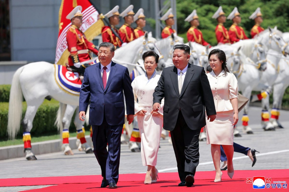 Xi-Kim-pledge-deeper-ties-as-North-Korea-visit-ends.jpg