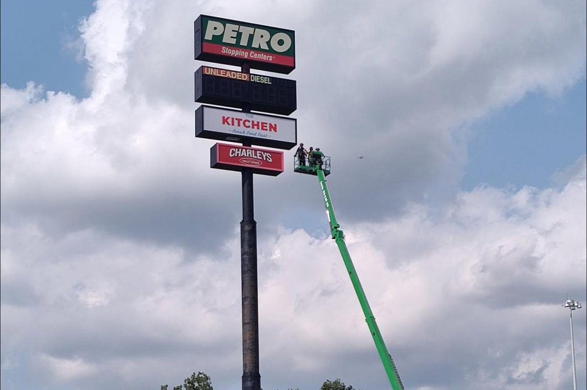 Trapped-worker-rescued-from-130-foot-tall-gas-station-sign.jpg