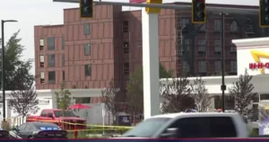 1785712065757_wnn_dgi_new_video_shows_moment_hero_fires_at_shooter_at_idaho_inandout_260802_S3_1920x.webp