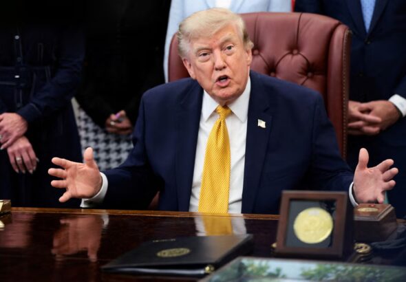 2026-08-03T231416Z_1529174320_RC22RMABR6P1_RTRMADP_3_USA-TRUMP-SPEECH.JPG