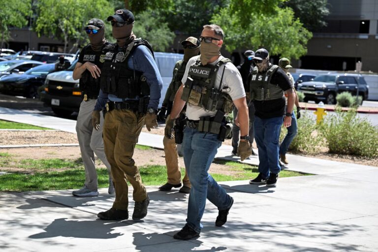 2026-08-13T010844Z_2039020134_RC2MMEAR62Y2_RTRMADP_3_USA-TRUMP-ICE-GLOVES.JPG