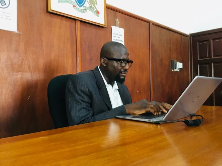 He-follows-proceedings-on-his-computer-1788798143.jpg