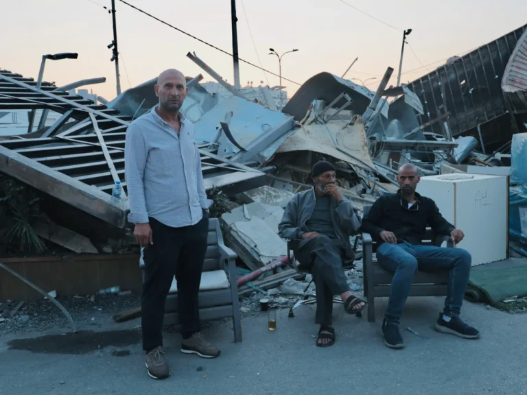 Sufian-Qawasmi-stands-in-front-of-the-rubble-after-demolishing-his-factory.-Photo-by-Sari-Jaradat-17.webp